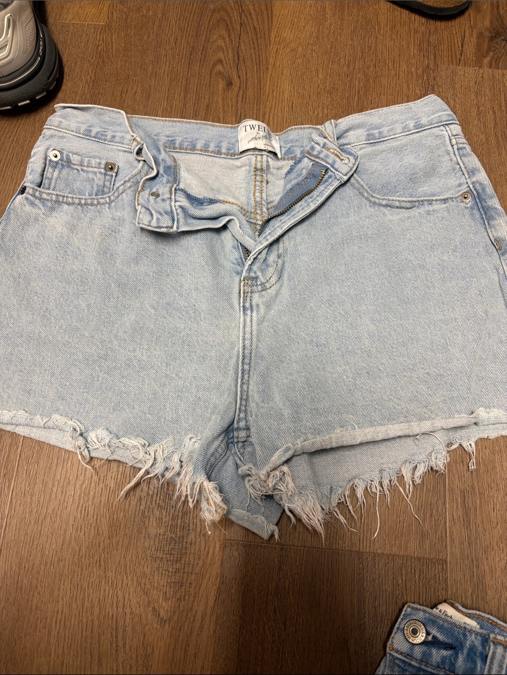 Twelve by Twelve Light Blue Frayed Denim Cutoff Shorts